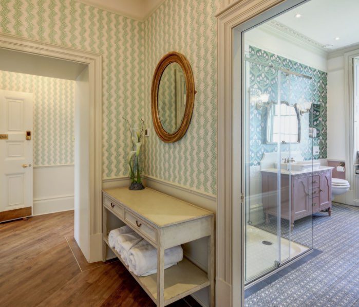 The lobby and bathroom of the Wedding Suite. 